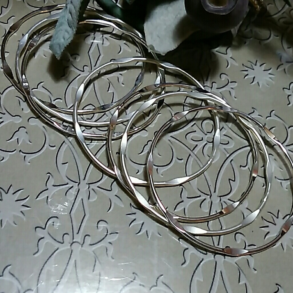 Silver toned bracelet set of 7